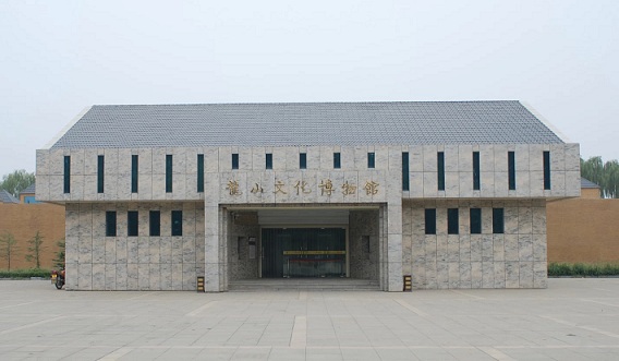 龙山博物馆:简朴的石磨盘和石磨棒-中国文物网